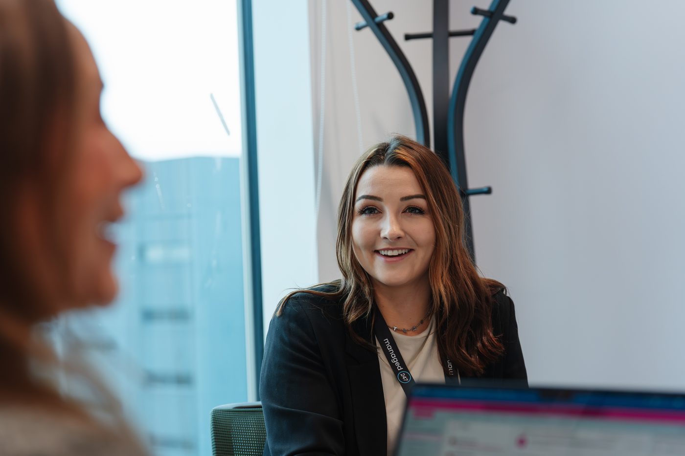 A member of the Managed247 channel team in conversation